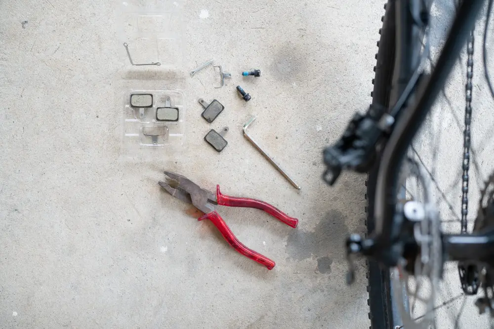 How to clean WD40 sticky on brake pads